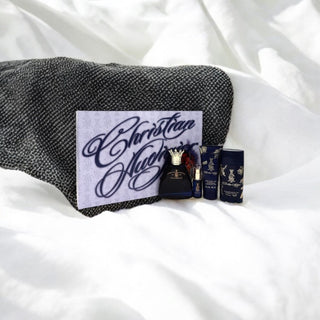 Christian Audigier by Christian Audigier Gift Set - 3.4 oz Eau De Toilette Spray + .25 oz MIN EDT + 3 oz Body Wash + 2.75 Deodorant Stick